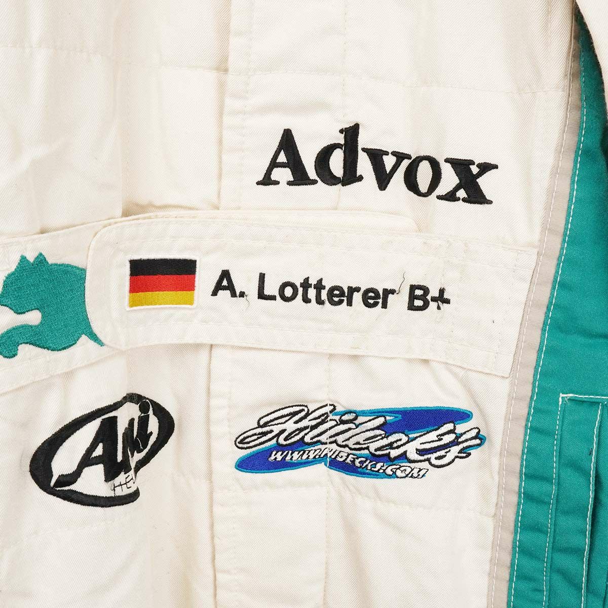 TOM’S｜SF2012PETRONAS アンドレ・ロッテラー選手着用 レーシングスーツ｜アウター